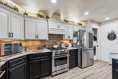 Tucked inside Granbury's beloved Waters Edge community, this on Harbor Lakes Golf Club in Texas - for sale on GolfHomes.com, golf home, golf lot