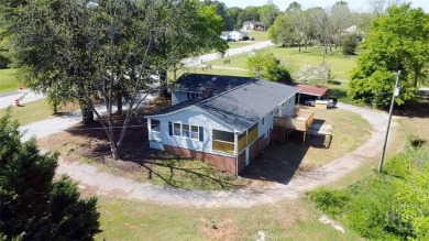 Set on approximately 1.47 acres, this fully remodeled on Cateechee Golf Club in Georgia - for sale on GolfHomes.com, golf home, golf lot