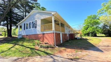 Set on approximately 1.47 acres, this fully remodeled on Cateechee Golf Club in Georgia - for sale on GolfHomes.com, golf home, golf lot