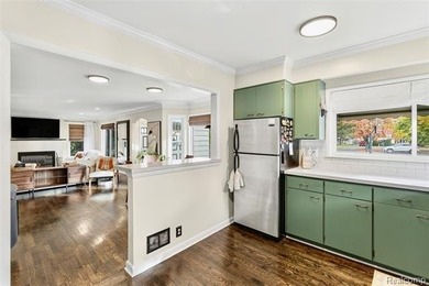 Enjoy a beautiful blend of comfort and character with this on Kearsley Lake Golf Course in Michigan - for sale on GolfHomes.com, golf home, golf lot