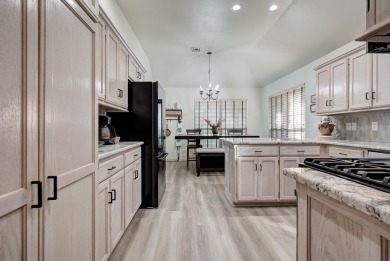 Beautifully updated home nestled in a quiet area with golf on Pheasant Run in Oklahoma - for sale on GolfHomes.com, golf home, golf lot