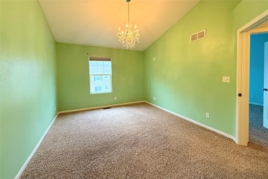 You'll love everything about this 2-bedroom, 2.5-bath townhome on Otter Creek Golf Course in Iowa - for sale on GolfHomes.com, golf home, golf lot