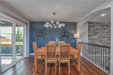 Welcome to comfort and style in this charming 1.5-story reverse on Prairie Highlands Golf Course in Kansas - for sale on GolfHomes.com, golf home, golf lot