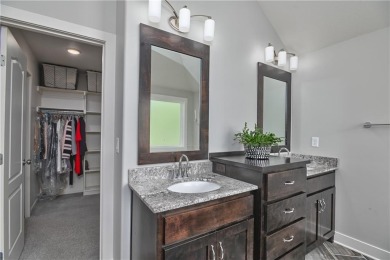Welcome to comfort and style in this charming 1.5-story reverse on Prairie Highlands Golf Course in Kansas - for sale on GolfHomes.com, golf home, golf lot