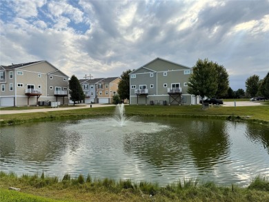 You'll love everything about this 2-bedroom, 2.5-bath townhome on Otter Creek Golf Course in Iowa - for sale on GolfHomes.com, golf home, golf lot