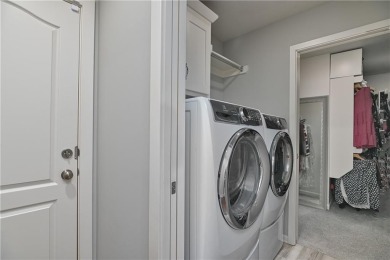 Welcome to comfort and style in this charming 1.5-story reverse on Prairie Highlands Golf Course in Kansas - for sale on GolfHomes.com, golf home, golf lot