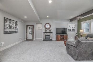Welcome to comfort and style in this charming 1.5-story reverse on Prairie Highlands Golf Course in Kansas - for sale on GolfHomes.com, golf home, golf lot