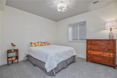 Welcome to comfort and style in this charming 1.5-story reverse on Prairie Highlands Golf Course in Kansas - for sale on GolfHomes.com, golf home, golf lot