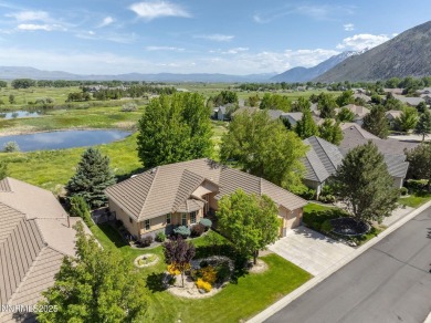 Nestled in a gated golf course community and overlooking serene on Genoa Lakes Golf Club - Lakes Course in Nevada - for sale on GolfHomes.com, golf home, golf lot