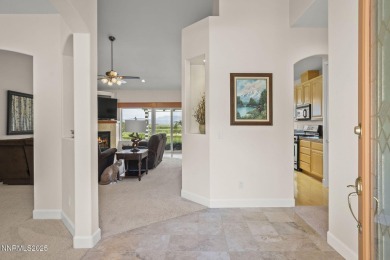 Nestled in a gated golf course community and overlooking serene on Genoa Lakes Golf Club - Lakes Course in Nevada - for sale on GolfHomes.com, golf home, golf lot