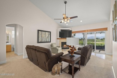 Nestled in a gated golf course community and overlooking serene on Genoa Lakes Golf Club - Lakes Course in Nevada - for sale on GolfHomes.com, golf home, golf lot
