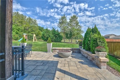 Welcome to comfort and style in this charming 1.5-story reverse on Prairie Highlands Golf Course in Kansas - for sale on GolfHomes.com, golf home, golf lot