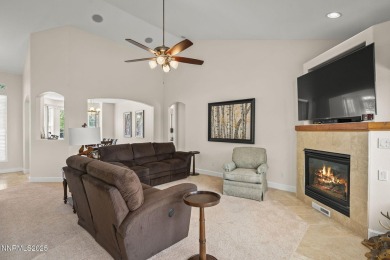 Nestled in a gated golf course community and overlooking serene on Genoa Lakes Golf Club - Lakes Course in Nevada - for sale on GolfHomes.com, golf home, golf lot