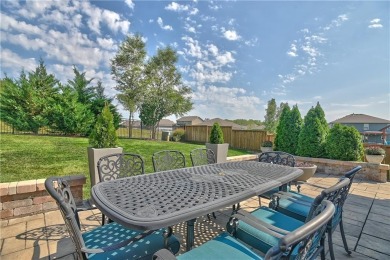 Welcome to comfort and style in this charming 1.5-story reverse on Prairie Highlands Golf Course in Kansas - for sale on GolfHomes.com, golf home, golf lot