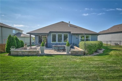 Welcome to comfort and style in this charming 1.5-story reverse on Prairie Highlands Golf Course in Kansas - for sale on GolfHomes.com, golf home, golf lot