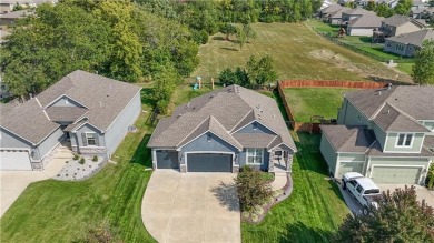 Welcome to comfort and style in this charming 1.5-story reverse on Prairie Highlands Golf Course in Kansas - for sale on GolfHomes.com, golf home, golf lot