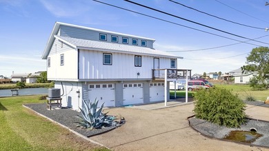Coastal charm meets waterfront living in this beautifully on Rockport Country Club in Texas - for sale on GolfHomes.com, golf home, golf lot