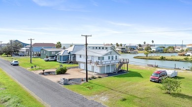 Coastal charm meets waterfront living in this beautifully on Rockport Country Club in Texas - for sale on GolfHomes.com, golf home, golf lot