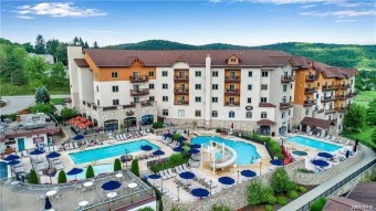 This Tamarack Club One Bedroom (F Unit - Lockout) gives you one on Holiday Valley Resort in New York - for sale on GolfHomes.com, golf home, golf lot