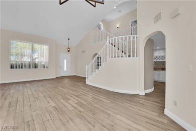 Welcome to 5205 Coral Glow, a stunning residence nestled within on Painted Desert Golf Club in Nevada - for sale on GolfHomes.com, golf home, golf lot