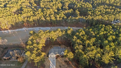 Golf-front elegance meets resort-style living in this on Deercroft Golf and Country Club in North Carolina - for sale on GolfHomes.com, golf home, golf lot
