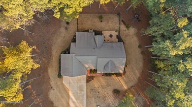 Golf-front elegance meets resort-style living in this on Deercroft Golf and Country Club in North Carolina - for sale on GolfHomes.com, golf home, golf lot