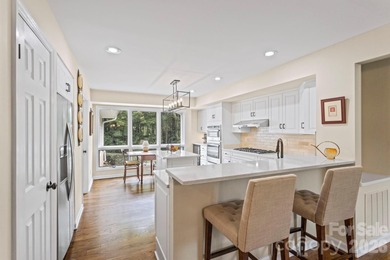 Absolutely Exceptional Freestanding Villa on the 16th Fairway in on Kenmure Country Club in North Carolina - for sale on GolfHomes.com, golf home, golf lot