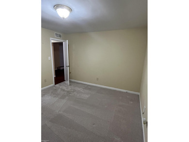 Welcome home to this charming 3-bedroom residence nestled in a on Lake Erie Metropark Golf Course in Michigan - for sale on GolfHomes.com, golf home, golf lot