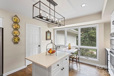 Absolutely Exceptional Freestanding Villa on the 16th Fairway in on Kenmure Country Club in North Carolina - for sale on GolfHomes.com, golf home, golf lot