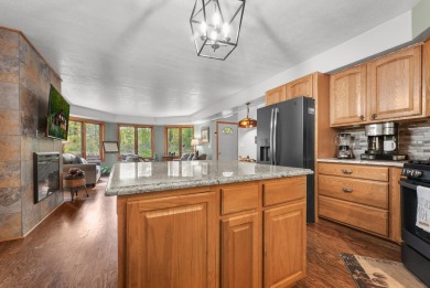 Higgins Lake Private Lake Access home -Discover the perfect on Ye Olde Country Club in Michigan - for sale on GolfHomes.com, golf home, golf lot