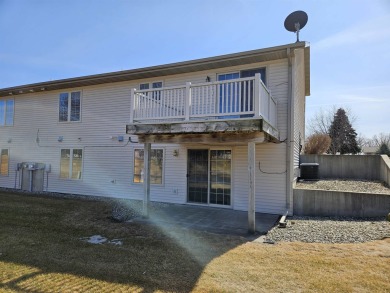 Showings begin 3/15. Beautiful kitchen with solid surface on Saddle Ridge Golf Club in Wisconsin - for sale on GolfHomes.com, golf home, golf lot