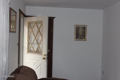YOUR AFFORDABLE HIDEAWAY IN THE HIDEOUT AWAITS.  This 2 bed 1 on The Hideout Golf in Pennsylvania - for sale on GolfHomes.com, golf home, golf lot