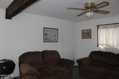 YOUR AFFORDABLE HIDEAWAY IN THE HIDEOUT AWAITS.  This 2 bed 1 on The Hideout Golf in Pennsylvania - for sale on GolfHomes.com, golf home, golf lot