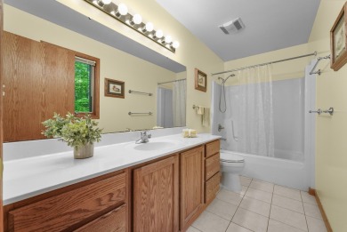 Higgins Lake Private Lake Access home -Discover the perfect on Ye Olde Country Club in Michigan - for sale on GolfHomes.com, golf home, golf lot