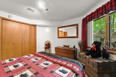 Higgins Lake Private Lake Access home -Discover the perfect on Ye Olde Country Club in Michigan - for sale on GolfHomes.com, golf home, golf lot