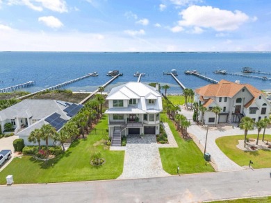 Experience unparalleled luxury in this custom-built 4,000 sq. ft on Tiger Point Golf and Country Club in Florida - for sale on GolfHomes.com, golf home, golf lot