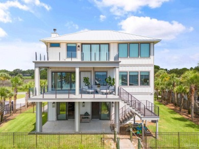 Experience unparalleled luxury in this custom-built 4,000 sq. ft on Tiger Point Golf and Country Club in Florida - for sale on GolfHomes.com, golf home, golf lot