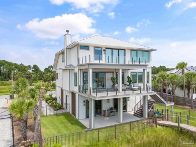 Experience unparalleled luxury in this custom-built 4,000 sq. ft on Tiger Point Golf and Country Club in Florida - for sale on GolfHomes.com, golf home, golf lot