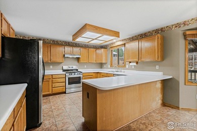 Welcome to this highly desirable home in West Loveland's on Cattail Creek Golf Course in Colorado - for sale on GolfHomes.com, golf home, golf lot