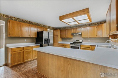 Welcome to this highly desirable home in West Loveland's on Cattail Creek Golf Course in Colorado - for sale on GolfHomes.com, golf home, golf lot