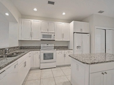 Beautiful 3 Bedroom 2 Bath 2007 town house with a two car garage on Oak Harbor Country Club in Florida - for sale on GolfHomes.com, golf home, golf lot