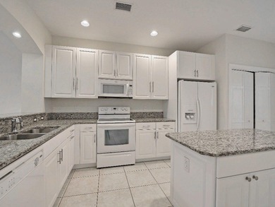 Beautiful 3 Bedroom 2 Bath 2450 Sq. Ft. 2007 town house with a on Oak Harbor Country Club in Florida - for sale on GolfHomes.com, golf home, golf lot