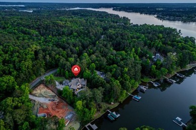 Welcome to your dream lakefront retreat in the prestigious on Reynolds Lake Oconee - The Plantation in Georgia - for sale on GolfHomes.com, golf home, golf lot