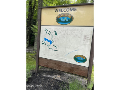 This property is sloping from the street down to the back on Paupack Hills Golf and Country Club in Pennsylvania - for sale on GolfHomes.com, golf home, golf lot