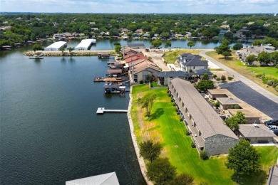 Enjoy lakefront living in this charming 2 bedroom, 1.5 bath on De Cordova Bend Country Club in Texas - for sale on GolfHomes.com, golf home, golf lot