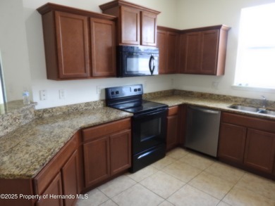 Lovely one owner home in the Sherman Hills golf course community on Sherman Hills Golf Club in Florida - for sale on GolfHomes.com, golf home, golf lot