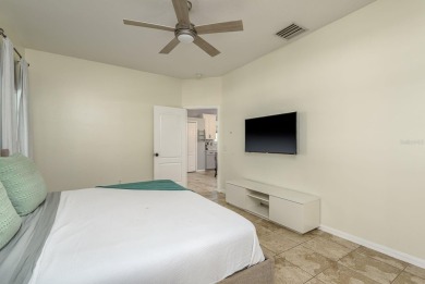Welcome to this stunning 4-bedroom, 3-bathroom pool home located on Fox Hollow Golf Club in Florida - for sale on GolfHomes.com, golf home, golf lot
