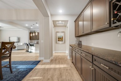 Beautifully landscaped single-story home with an inviting open on Wildhorse Golf Club of Robson Ranch in Texas - for sale on GolfHomes.com, golf home, golf lot