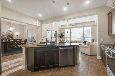 Beautifully landscaped single-story home with an inviting open on Wildhorse Golf Club of Robson Ranch in Texas - for sale on GolfHomes.com, golf home, golf lot