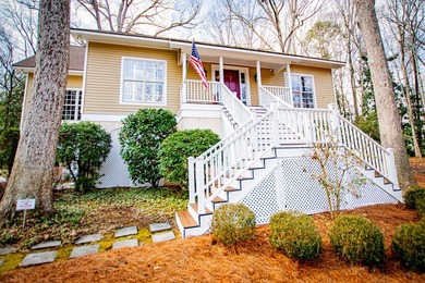 Welcome to classic Southern charm in highly sought-after Sunset on Sunset Hills Country Club in Georgia - for sale on GolfHomes.com, golf home, golf lot